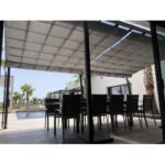 COULEURS DU MONDE - Pergola adossée Stockholm 3.5 x 6 m - Polycarbonate, acier, aluminium – Image 8